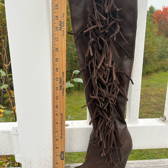 Knee high brown leather wedge boot with fringe detail. - Picture 3 of 9
